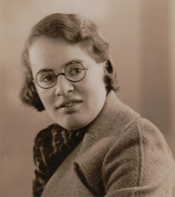 Joan Clarke in sepia tone, looking into the camera.